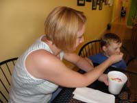 30-Mommy_and_Kenny_share_yogurt_at_the_self_serve_shop