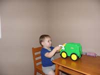 06-Daddy_and_Kenny_play_with_the_garbage_truck