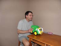 07-Daddy_and_Kenny_play_with_the_garbage_truck