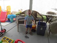 15-Kenny's_thrilled_to_find_a_puddle_on_the_patio