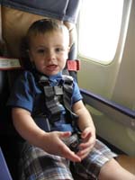 03-Kenny_in_his_harness_on_the_plane