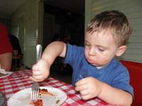 08-Kenny_eating_Fricanos_Pizza