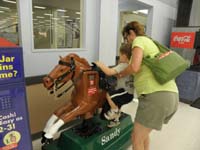 20-putting_Kenny_on_the_one_cent_(yes_one_cent)_pony_ride