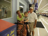23-Grammy_and_Grandpa_Duke_watch_Kenny_ride_the_pony