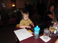 33-letting_Kenny_watch_a_DVD_so_Mommy_can_eat_in_peace