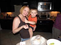 18-Mommy_and_Kenny_eat_birthday_cake