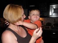 19-Mommy_and_Kenny_eat_birthday_cake
