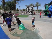 15-when_the_water_started_he_hooped_off_and_the_big_kids_swarmed