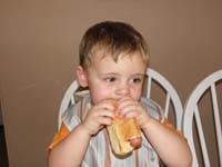 19-Kenny_eating_his_hot_dog_like_a_big_boy