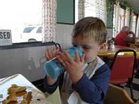 12-Kenny_drinks_like_Daddy-keeps_his_dirty_fingers_off_the_cup