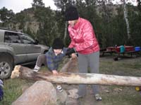 29-Mommy_helps_Kenny_climb_on_his_balance_beam_log