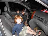 90-Kenny's_ready_to_drive_while_Nick_watches_a_video_in_the_Owen's_van