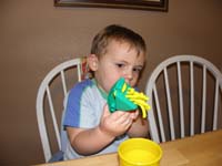 04-Kenny_plays_with_Play-Doh-he's_really_concentrating