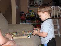 28-Kenny's_playing_with_Mommy_solving_a_block_puzzle