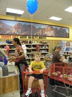 63-Kenny_gets_his_balloon_at_Trader_Joe's