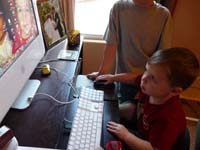 13-looks_like_Kenny's_proficient_in_using_an_Apple