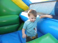 19-Kenny_in_a_blow_up_obstacle_course_and_slide