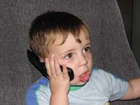 58-Kenny_talking_on_the_phone_with_Baba