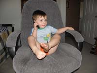 59-Kenny_relaxing_in_the_chair_talking_to_Baba
