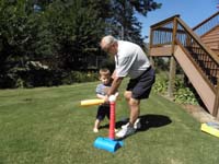 09-Duke_shows_Kenny_how_to_swing