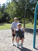 17-Duke_pushes_Kenny_on_a_swing