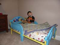 64-Kenny_in_his_SpongeBob-bed