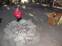 39-Kenny_helps_Daddy_build_a_fire