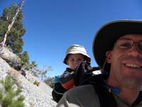 15-Kenny_on_Daddy's_back-he_doesn't_look_happy