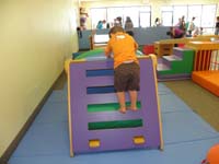48-big_boy_Kenny_navigates_the_little_ladder_with_ease_on_his_final_days_at_Gymboree