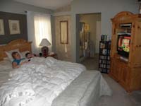 12-sicky_Kenny_and_Mommy_watch_TV_in_bed