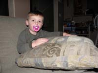 19-Kenny_has_pacifiers_because_he's_sick-and_he_has_his_pillow