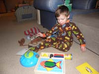 37-look_at_all_his_loot-thank_you_Baba_and_Poppy