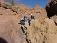 16-Daddy_cantilevers_loosing_balance_coming_down_a_boulder_with_Kenny