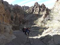 19-Daddy_and_Kenny_with_window_in_rock_high_above