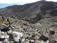 30-we_went_back_to_the_trail-now_Lake_Mead_is_visible-tough_terrain_carrying_Kenny