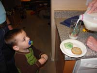 25-getting_cookies_and_milk_ready_for_Santa