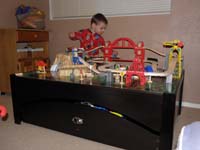 39-Kenny_can't_get_enough_of_the_train_table