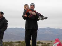 42-Uncle_Tommy_scoops_up_the_boy-it's_time_to_go