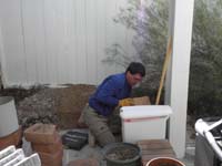60-Daddy_filling_the_yard_with_ill-begotten_rocks