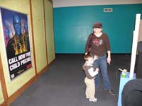 11-after_ten_minutes_Kenny_finally_walks-tries_to_play_with_the_Blue_Man_Group_drums
