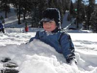 48-Kenny_likes_being_buried_in_snow
