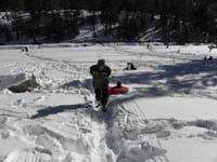 63-Daddy_pulling_Kenny_up_the_slope