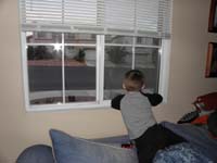 01-Kenny_looking_out_the_front_window_for_Baba_and_Poppy_to_arrive