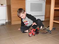11-Kenny_plays_with_his_new_motorcycle