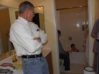 12-Poppy_and_Baba_watch_Kenny_in_the_bath