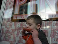 28-he_eats_the_hot_dog_his_own_way-starting_in_the_middle