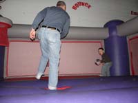 53-Poppy_and_Kenny_playing_ball_in_a_bouncy_house
