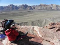 17-Kenny_admiring_the_scenery_from_top_of_Calico_Hills-parking_lot_one_third_mile_away_400_feet_lower