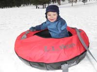 55-Kenny's_happy_being_towed_in_the_tube-keeps_saying_'more'