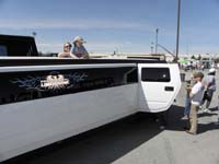 27-Kenny_poking_his_head_through_the_sun_roof_of_a_stretch_Hummer